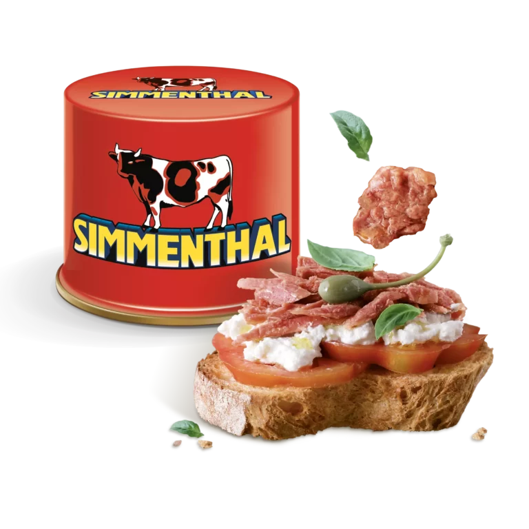 Confezione di Spimmenthal e fetta di pane con la carne, un cappero, pomodoro e mozzarella